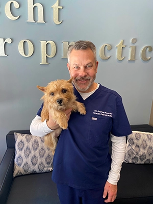 Dr. Andrew Knecht with Lulu, the dog